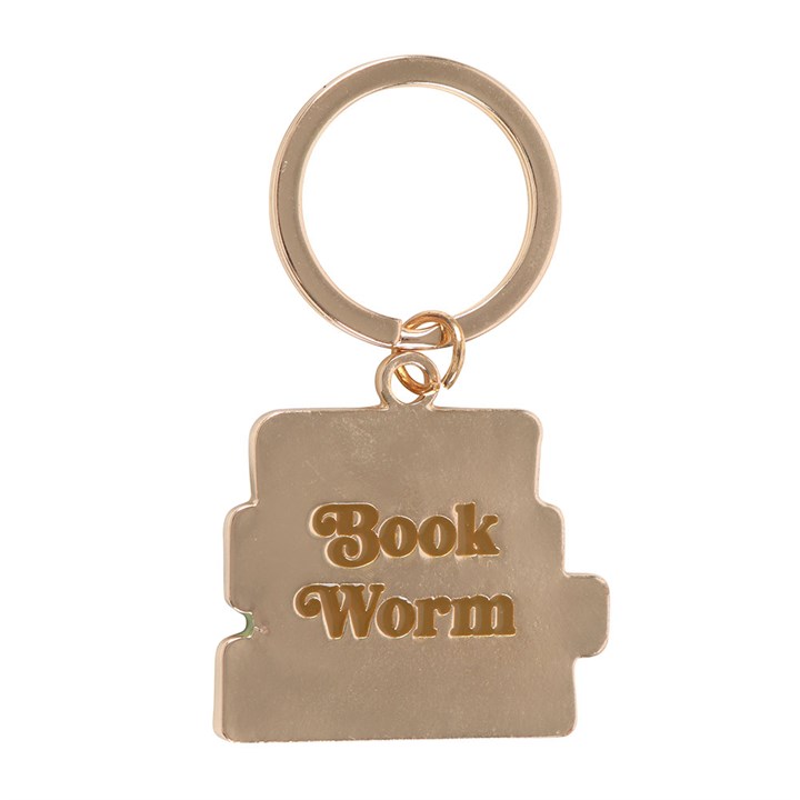 Close-up of back of a enamel keyring, showing engraving of the words 'Book Worm' on a white background