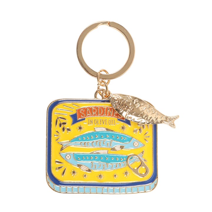 Vibrant yellow and blue enamel keyring shaped like a sardine tin with a small dangling gold fish charm on white background