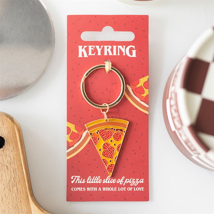 Gold-tone enamel keyring shaped like a pizza slice with red pepperoni toppings and a yellow cheese finish.