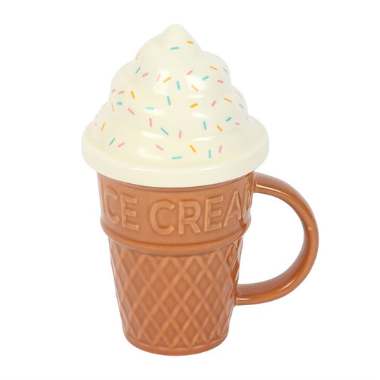 Ceramic mug shaped like a brown waffle ice cream cone with 'ICE CREAM' embossed on the rim, topped with a white swirled soft-serve lid with pastel sprinkles