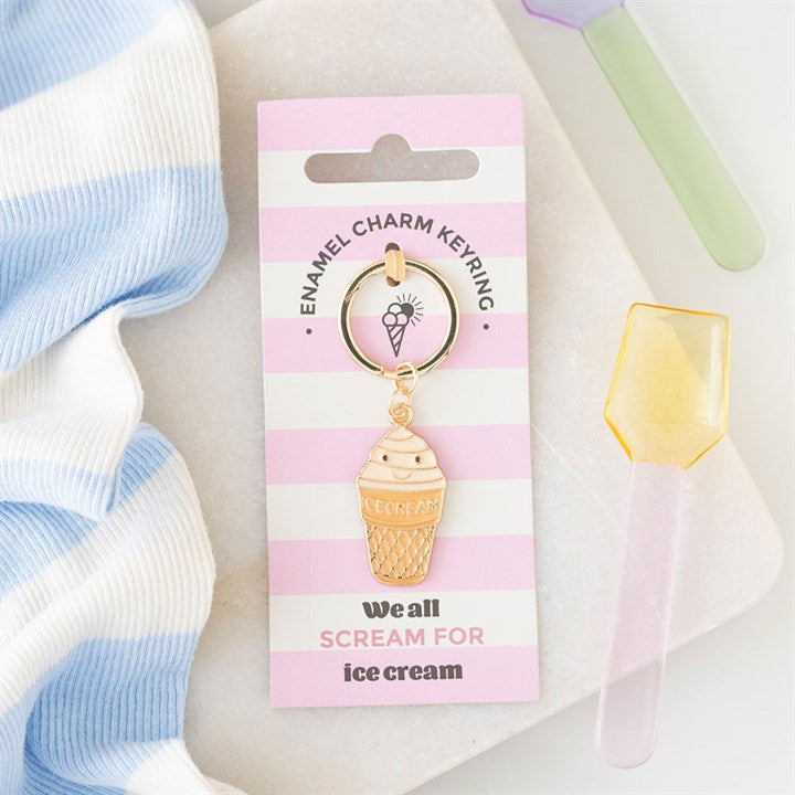 Cute enamel ice cream cone keyring on a pink and white striped card that says 'We all scream for ice cream'