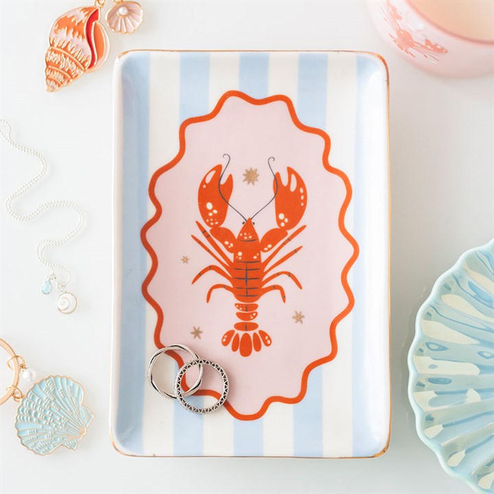 Rectangular ceramic trinket dish with a red lobster and light blue and white vertical stripes. 