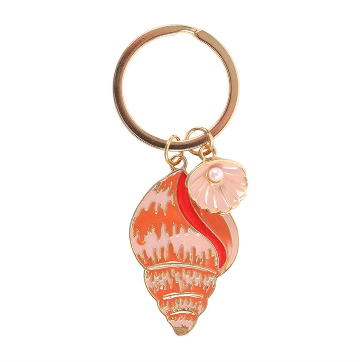 Peach and coral enamel conch shell keyring with a small oyster and pearl detail on white background