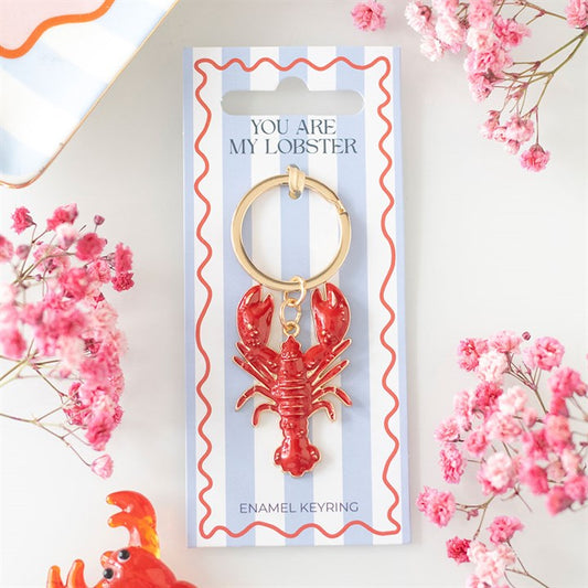 Red enamel lobster keyring with gold-tone hardware on a blue and white striped backing card that says 'You Are My Lobster'
