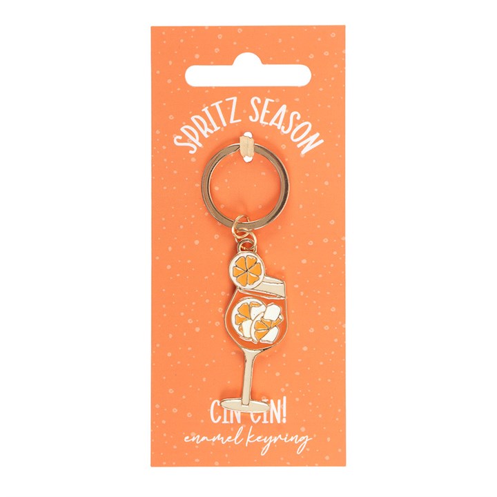 Gold-tone enamel keyring featuring a vibrant orange spritz cocktail glass with an orange slice on white background