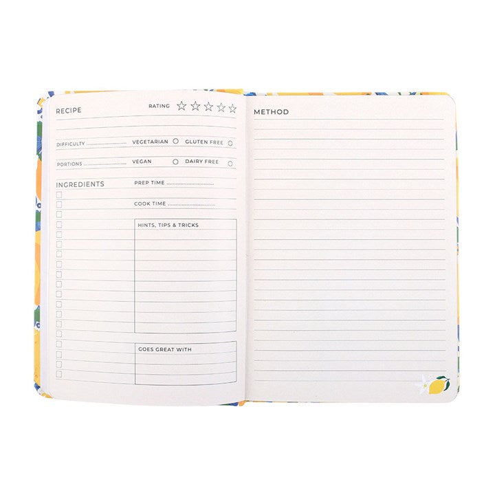 Open recipe book with blank pages for recording recipes on a white background