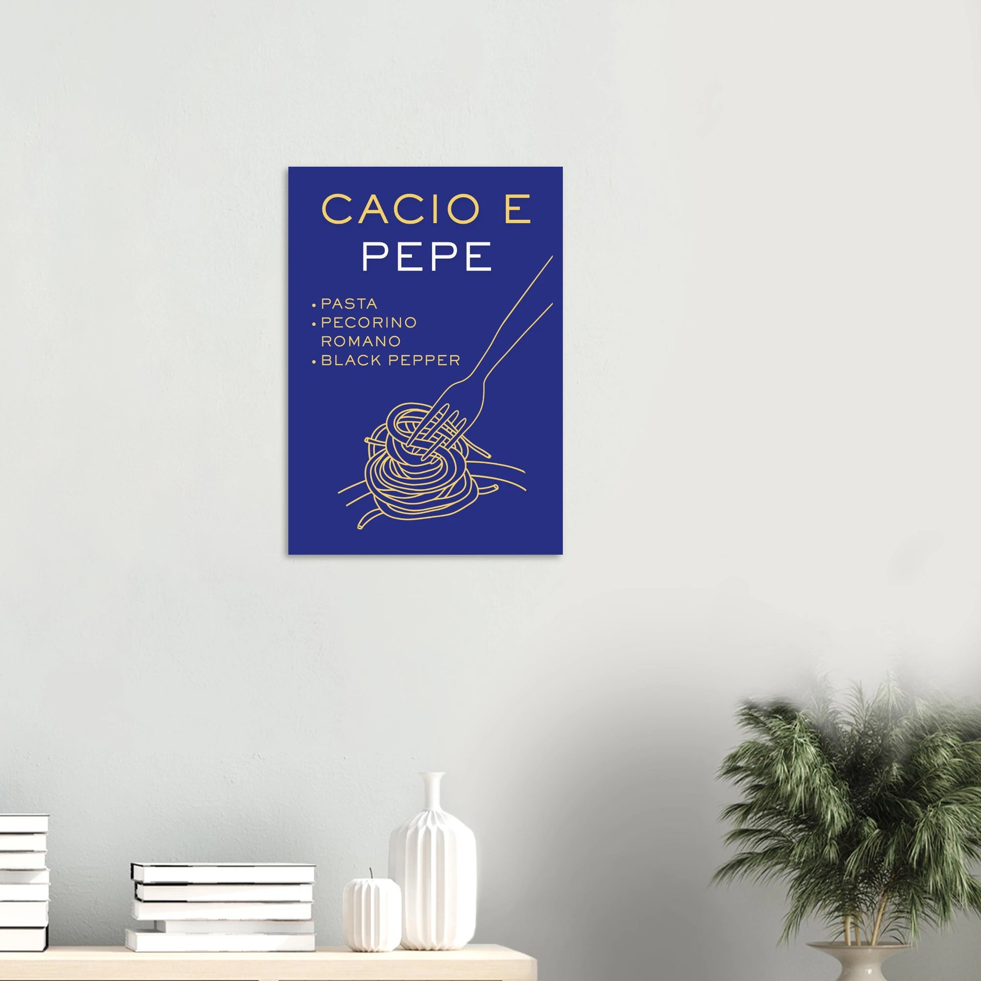 Aesthetic Italian food recipe art print titled Cacio e Pepe featuring an illustration of a fork twirling spaghetti over a solid cobalt blue background with clean typography.